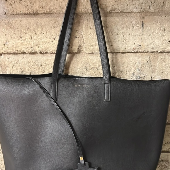 Saint Laurent Black and Gold Tote Bag with Structured Design - Picture 9 of 12